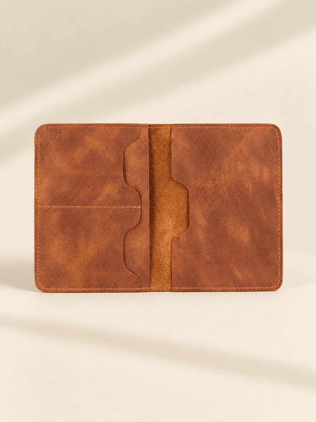 Passport holder in leather, by IND Leather Co.